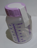 Bottle with tamper label on